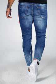 Mm Blue Washed Jeans with White Rips Red Patches Zip With White Bottom Detail
