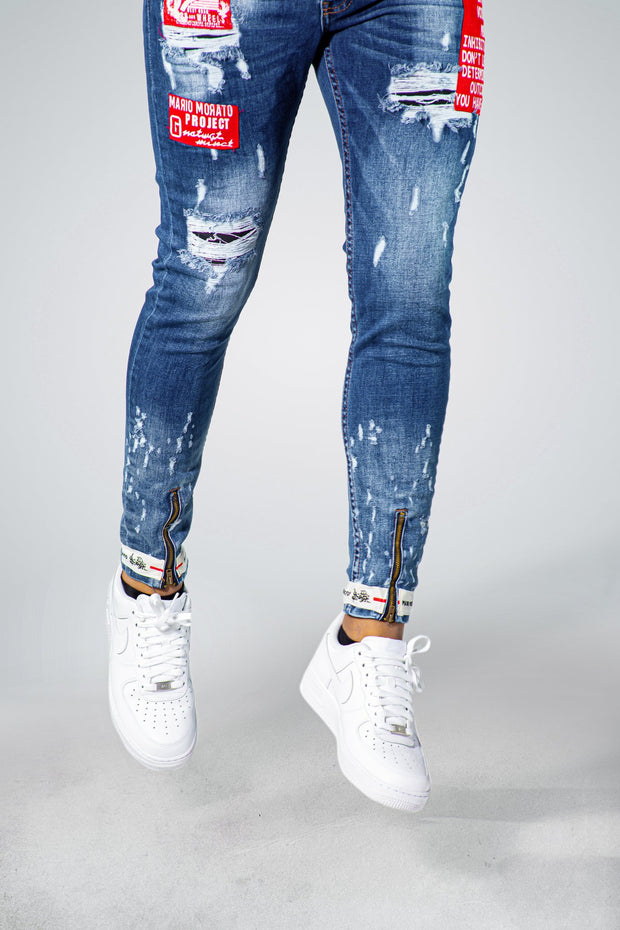 Mm Blue Washed Jeans with White Rips Red Patches Zip With White Bottom Detail